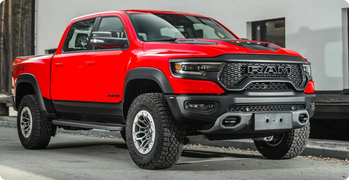 Bold red Ram truck with rugged design.