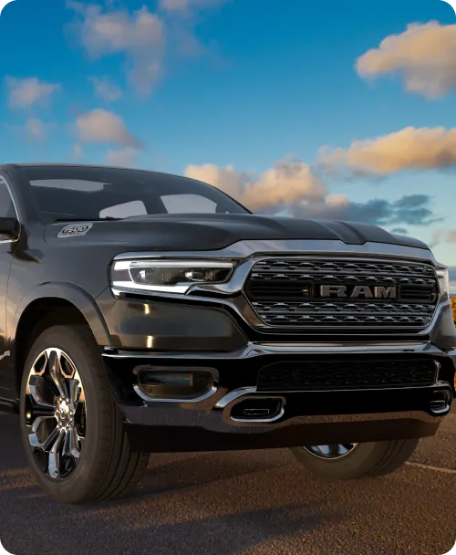 Sleek black RAM truck in sunlight