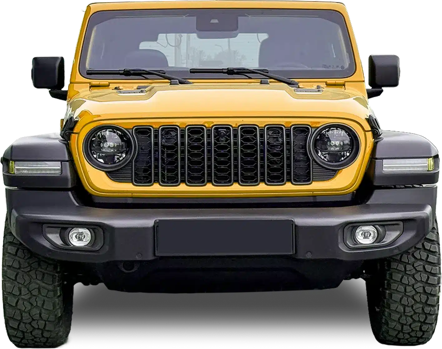 Yellow Jeep with aggressive front design.