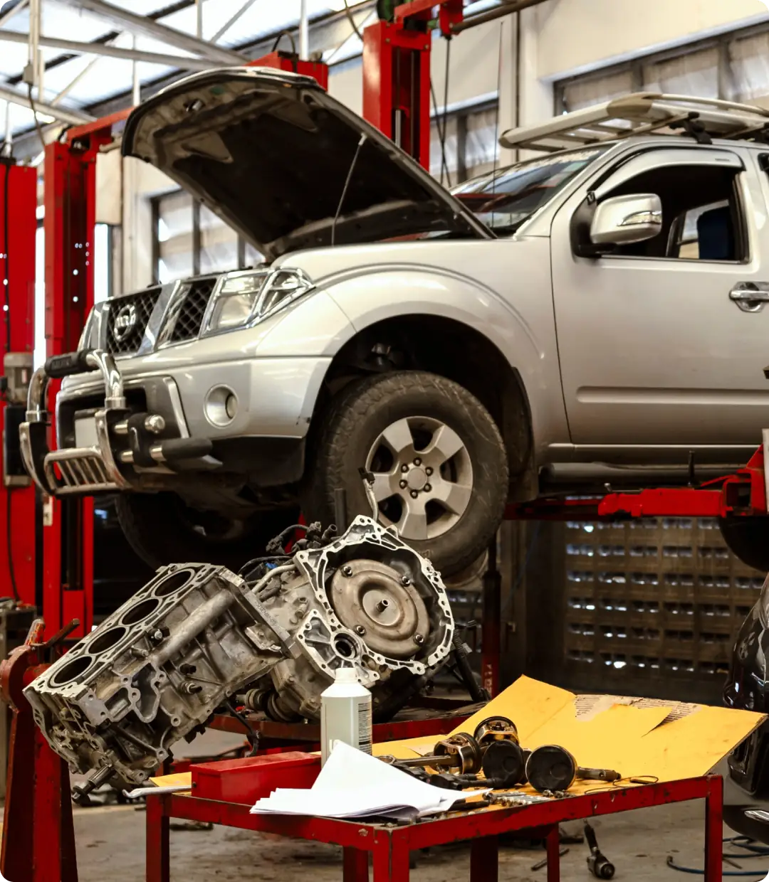Car repair in a workshop setting