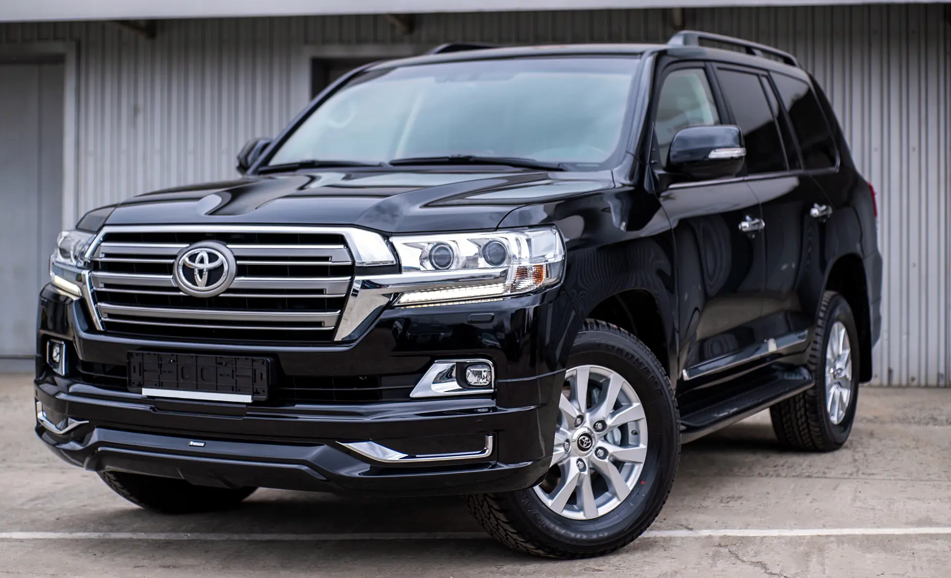 Toyota repair in Albuquerque, NM by Albuquerque Auto Repair and Tire. Image of a black Toyota SUV parked outside, emphasizing maintenance and reliability for everyday performance.